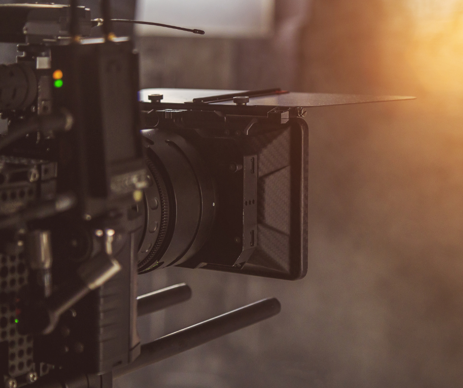 Close-up of a film camera capturing Hollywood romance vibes, perfect backdrop for a book review or book club pick about second chance love.